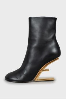 Leather ankle boots with gold heels