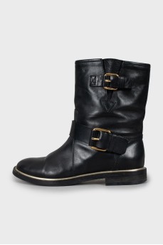 Leather boots with gold hardware
