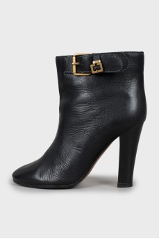 Leather ankle boots with gold buckle