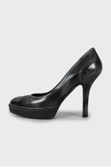 Perforated leather heels