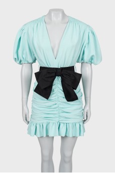 Dress with puff sleeves and drapery