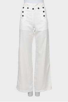 Palazzo trousers decorated with buttons