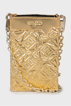 Gold-tone phone case on a chain