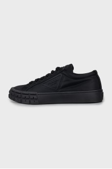 Textile sneakers with embossed logo