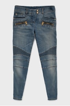 Skinny jeans with gold zippers