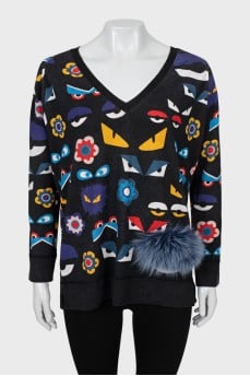 Printed pullover decorated with fur