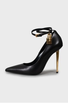 Leather pumps with gold stiletto heels