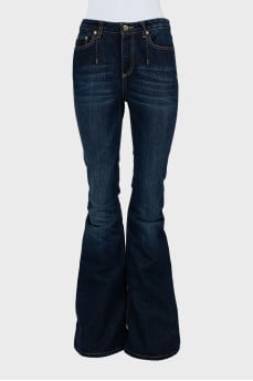 Flared jeans with gold shimmer