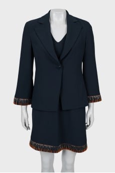 Costume of dress and jacket with beads