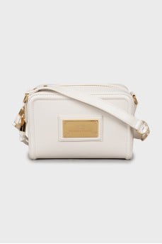 White crossbody bag with tag
