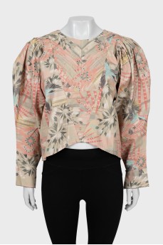 Cropped blouse with voluminous sleeves