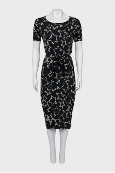 Dress decorated with rhinestones with a tag