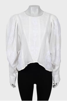 Loose blouse with embroidery and tag