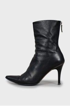 Black leather ankle boots with pointed toe