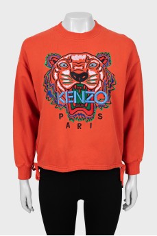 Sweatshirt with print and ties at the bottom