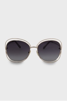 Sunglasses with gold frame and temples