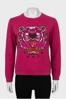 Pink sweatshirt with signature print