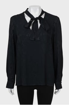 Animal print blouse with tie