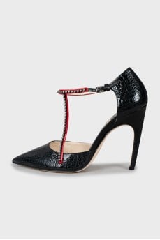 Shoes with embossed leather and rhinestones