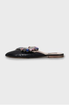 Leather mules decorated with rhinestones
