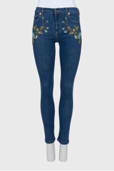 Skinny jeans decorated with stripes