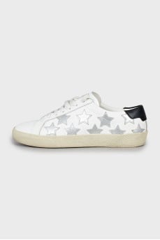 Leather sneakers decorated with stripes
