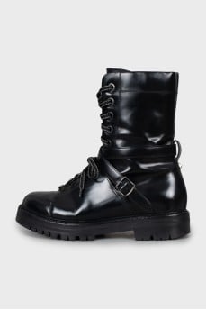 Lace-up boots decorated with buckles