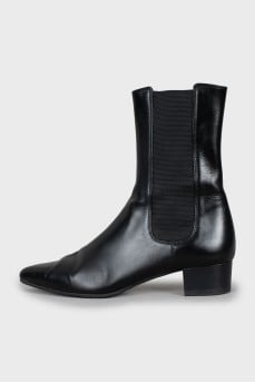 Black ankle boots with textile inserts