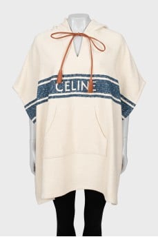 Cape with hood and branded logo
