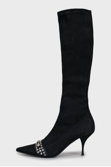 Suede over-the-knee boots decorated with eyelets