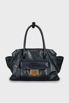 Black tote bag with gold hardware