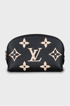 Leather cosmetic bag with embossing and tag
