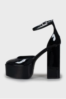 Black patent leather shoes with tag