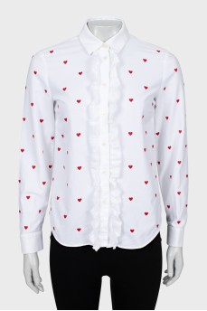 Fitted shirt decorated with embroidery