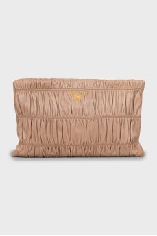 Leather clutch with gold logo