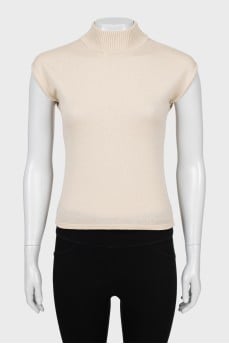 Knitted vest with a high neck