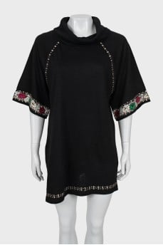 Sweater decorated with beads and embroidery