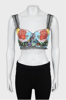 Top in a print decorated with lace