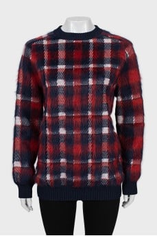 Long pile sweater with tag