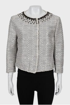 Jacket decorated with sequins and rhinestones