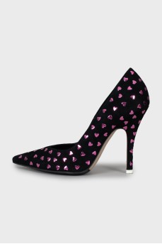 Suede shoes decorated with hearts
