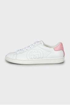 White leather sneakers with brand logo