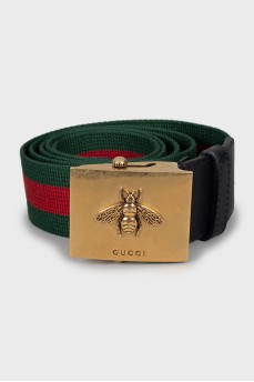 Textile belt with gold buckle