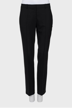 Tapered wool trousers with creases