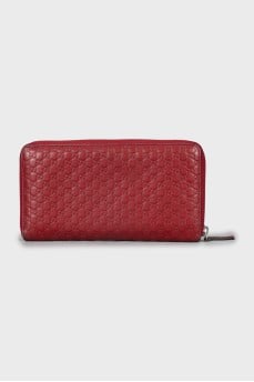 Wallet with branded embossed leather