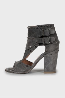 Grey suede ankle boots with studs