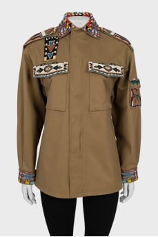 Khaki jacket decorated with beads