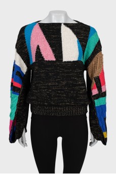 Knitted sweater with slits on the sleeves