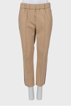 Tapered trousers with stripes