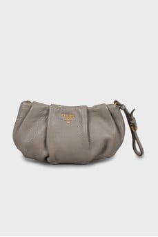 Leather clutch with gold logo